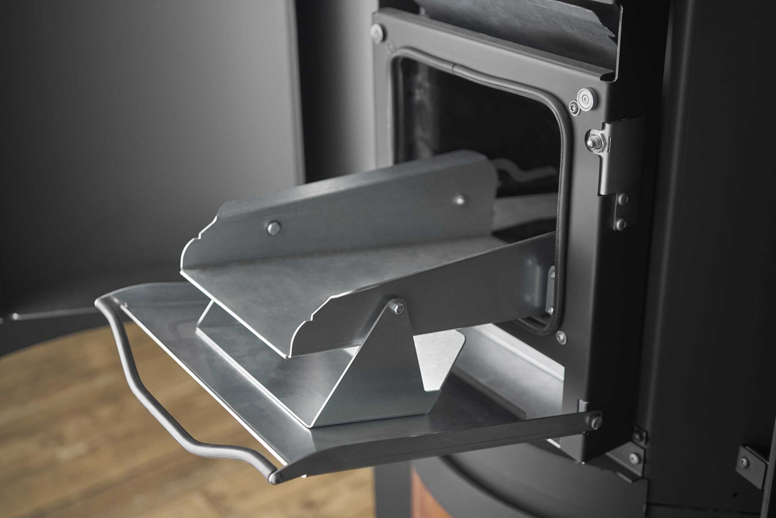 Wide loading tray for quick, clean pellet refilling